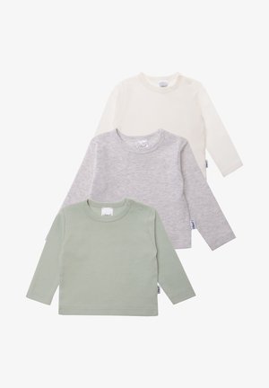 Set of three long-sleeve tops in cream, grey, and sage green. Each top has a round neckline and side snap buttons. Soft cotton fabric.