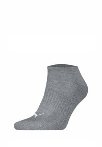 Grau farbige Knöchelsocke aus geripptem Stoff, mit einem weißen Logo nahe der Zehe. Glatte Textur und taillierte Form für Komfort.