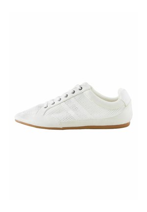 White low-top sneaker with lace-up closure, mesh panels, and a brown rubber sole, shown from the inner side.