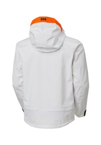 Witte waterdichte jas met oranje capuchonrand en zwart "HH"-logo op de achterkant, gezien van achteren.