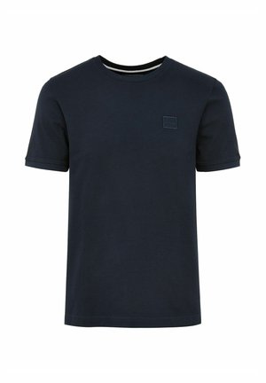 Granatowa koszulka w krótkim rękawie, wykonana z bawełny, z okrągłym dekoltem i małą, wytłoczoną łatką z logo na piersi. Gładka faktura.
