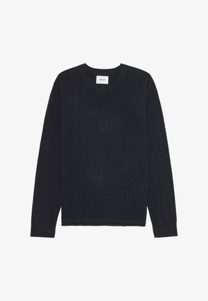 Zwarte trui gemaakt van een zachte, gestructureerde stof. Ronde halslijn, lange mouwen, en ribbels aan de mouwen en onderrand. Minimalistisch ontwerp zonder patronen.