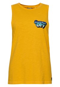 Top giallo senza maniche realizzato in tessuto morbido, con un logo "Superdry" blu e nero sul petto. Collo rotondo e orlo cucito.