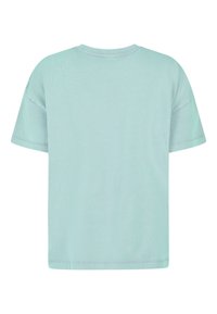 Lichtblauwe T-shirt met korte mouwen van katoen, met een ronde halslijn en een ontspannen pasvorm. Soepele textuur met zichtbare stikseldetails.