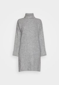Vestito a maglia grigio con collo a dolce vita, texture a coste, maniche lunghe e polsini arrotolati. Di lunghezza media con fessure laterali per facilitare i movimenti.