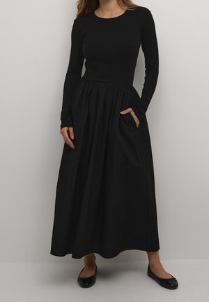 Stickad klänning - black