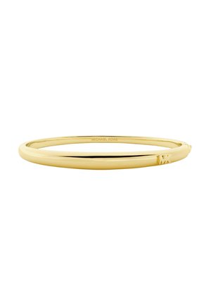 Gouden metalen bangle armband met een gladde, afgeronde vorm. Beschikt over een subtiele "MK" logo-accent en een gepolijste afwerking.