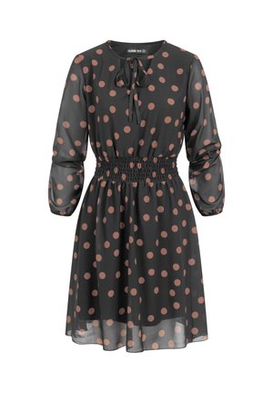 Zwarte jurk met lange mouwen en bruine polka dots, elastische taille en een klein strikje bij de halslijn.