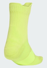 adidas Performance UNISEX żółty