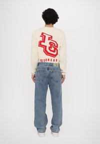 Icecream PANT - Laisvo kirpimo džinsai - vintage wash blue