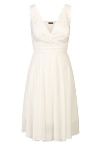 Robe blanche avec un corsage en dentelle, décolleté en V et une taille ajustée. La jupe tombe doucement, faite d'un tissu léger.