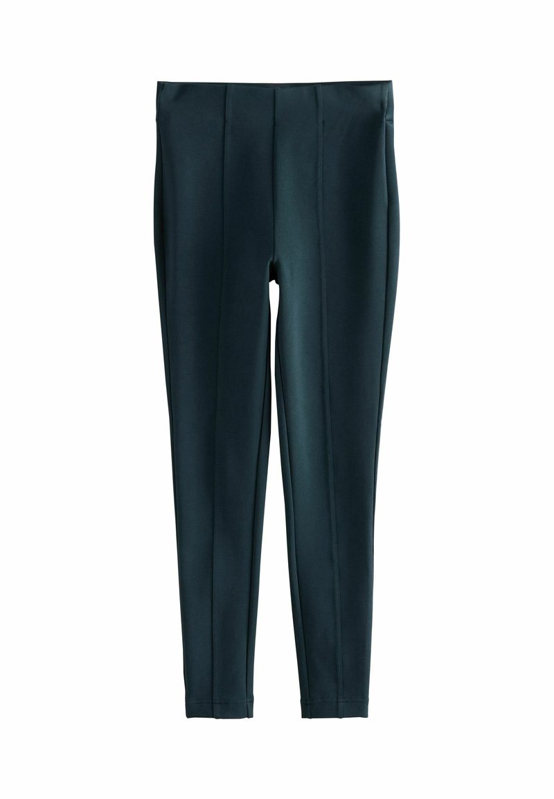 Tmavo zelené legíny vyrobené z elastického materiálu, s hladkou textúrou, slim fit strihom a jemnými vertikálnymi švami na prednej strane.