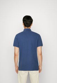 Tommy Hilfiger REGULAR - Poloshirt - blue coast
