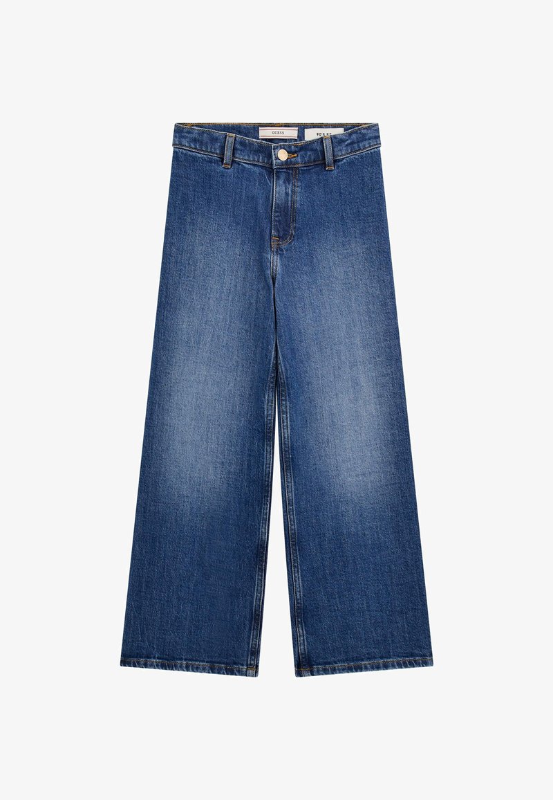 Laiad sinised denimpüksid kõrge vöökohaga, nööbiga sulgemine ja kontrastõmblused, sujuva tekstuuri ja nähtavate mustriteta.