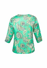 Türkisfarbene Bluse mit Dreiviertelärmeln, durchgehendem Paisley- und Blumenmuster in Blau- und Cremetönen.