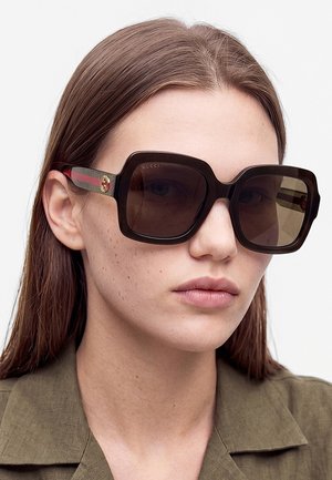 Gucci, Gafas de sol - black/green/brown