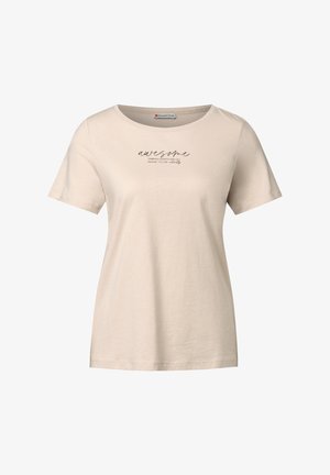T-shirt en coton beige clair à manches courtes, col rond, avec un design de texte imprimé en noir, mettant en avant le mot "awesome" avec des accents décoratifs.