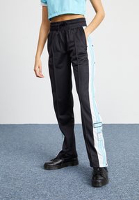 adidas Originals Träningsbyxor - black