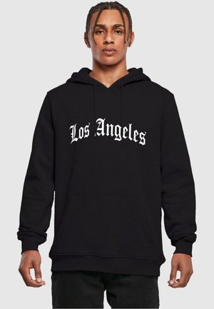 Black hoodie with a front pocket, features "Los Angeles" in stylized white lettering across the chest, made from soft, durable material.