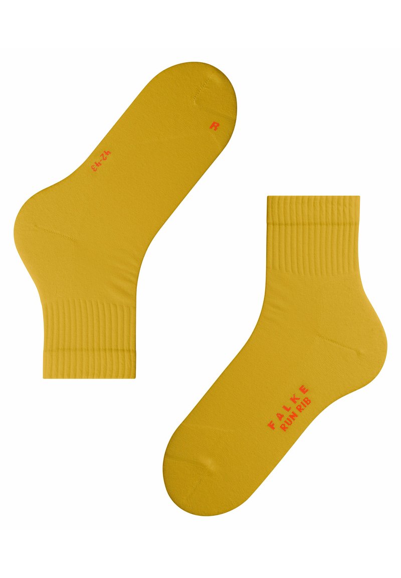 Gelbe Baumwollsocken mit gerippten Bündchen und roter Markenkennzeichnung. Sie verfügen über eine abgerundete Zehenpartie und eine taillierte Form für Komfort, gekennzeichnet mit 'R' für den rechten Socken.