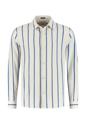 Camicia con bottoni bianca con righe verticali blu. Presenta un orlo curvo, maniche lunghe e tessuto leggermente strutturato. Chiusura frontale con bottoni.