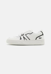 White sneaker with black accents, featuring a smooth leather upper, lace closure, and textured rubber sole with a geometric pattern.