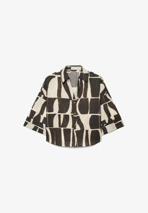 Camicia con bottoni, maniche larghe e motivo geometrico astratto in bianco e nero, con colletto appuntito.