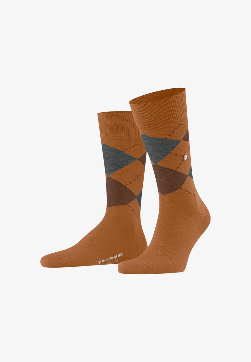 Chaussettes en argument marron avec un bord côtelé. Présentent des formes de losange en marron foncé et en teal. Tissu doux et zone de talon renforcée.