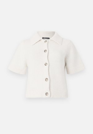 Cardigan bianco a maniche corte in maglia con colletto, dotato di cinque grandi bottoni e orlo e polsini a coste per texture e struttura.