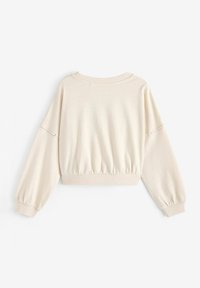 Helle beige verkürzte Sweatshirt mit weitem Ausschnitt, gerafftem Saum und Ballonärmeln. Hergestellt aus glattem Stoff mit dezenten Nähten.