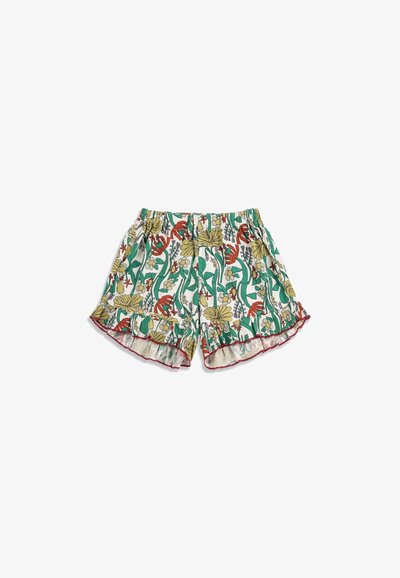 Shorts pour enfants avec taille élastique et ourlet à volants, présentant un motif floral coloré en vert, jaune, rouge et blanc sur un tissu léger.