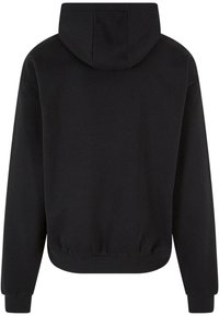 Sweat à capuche noir à manches longues avec poignets et bas côtelés, vu de dos.