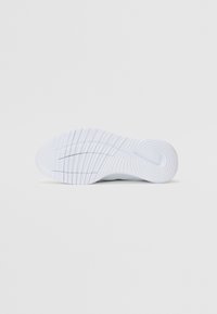 Valkoinen kuminen lenkkaripohja, jossa on teksturoitu pito, ominaisuutena urat ja pyöreät kuviot, suunniteltu tarjoamaan pitoa ja vakautta.