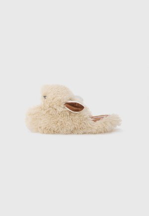 Fuzzy beige slippers shaped like a lamb, featuring brown accents for ears and eyes, with a soft textured exterior.