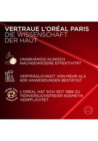Czerwone tło z białym tekstem podkreśla naukę o skórze L'Oréal Paris, twierdząc o klinicznie udowodnionej skuteczności oraz zobowiązaniu do braku okrucieństwa, z ikonami.