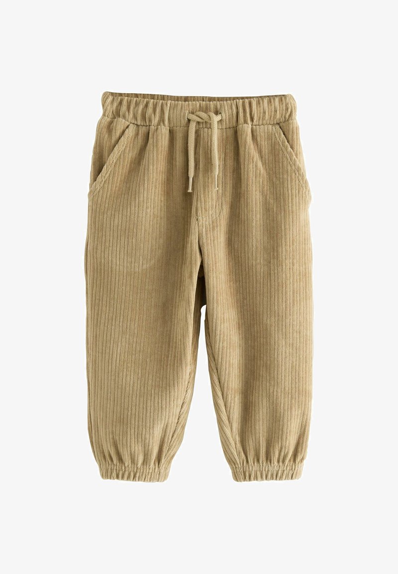 Pantalon en velours côtelé beige côtelé avec taille élastique, cordon de serrage, poches latérales et bas élastiques aux chevilles.