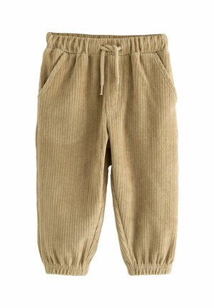 Pantalons en corduroy beige avec texture à rayures, taille élastique avec cordon de serrage et poches latérales. Les poignets sont élastiqués aux chevilles.