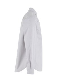 Chemise habillée gris clair à manches longues vue de côté, avec poignets boutonnés et col classique, sur fond blanc.