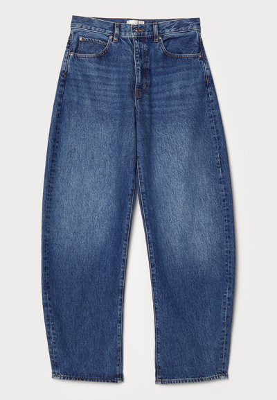 Denim jeans with a loose fit, mid-rise waist, deep blue color, faded texture, five-pocket design, and straight leg opening.