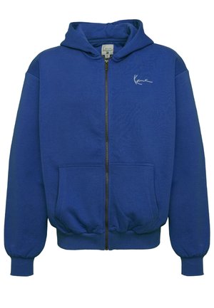 Blue zip-up hoodie made of soft fabric. Features a hood, long sleeves, front pockets, and a white logo on the chest. Ribbed cuffs and hem.