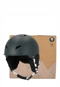 Svart matt hjälm med ventilationsslitsar, vit justerbar hakrem och mjukt innerlining. Presenterad på en kartonglåda med bergsgraphic.