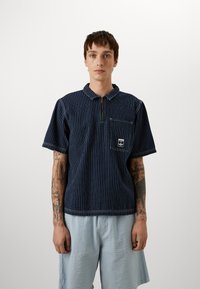 adidas Originals GRAPHIC  - Polo shirt - medium blue denim