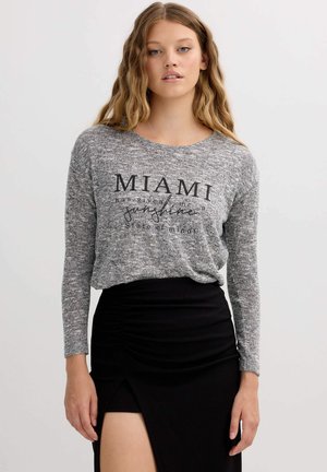 Blusa - gris