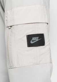 Nike Sportswear Tracksuit bottoms - grey