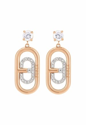 Oválne náušnice z ružového zlata s priesvitným okrúhlym kameňom a strieborným logom ozdobeným kryštálmi vnútri každého oválneho rámu.