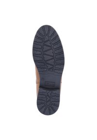 Semelle en cuir brun avec une semelle extérieure en caoutchouc noir texturé présentant un motif en zigzag pour une meilleure adhérence. Des marquages indiquent la taille 38.