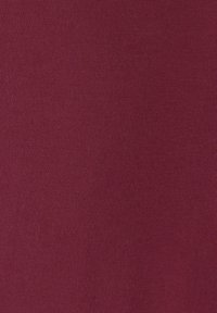 Burgundy fabric with a fine ribbed texture, smooth finish, and consistent pattern, suitable for garments or upholstery.