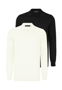 To lange langærmede polo shirts: en hvid og en sort, med krave og blødt strikmateriale. Enkel design uden mønstre.