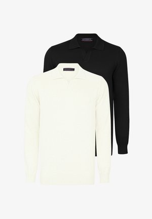 Dos camisetas polo de manga larga: una blanca y otra negra, con cuello y textura de punto suave. Diseño simple sin patrones.