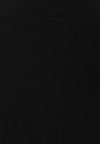 Black knit sweater featuring a smooth texture and a high neckline, made from a stretchy fabric for a fitted appearance.